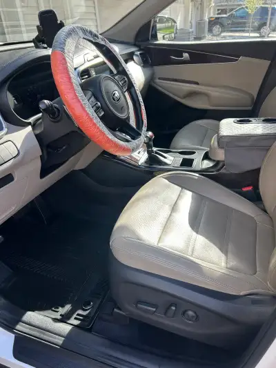 Interior detail — steering & front seats